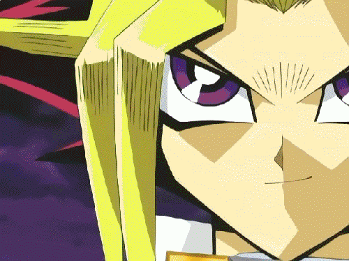 yugi fliping a card